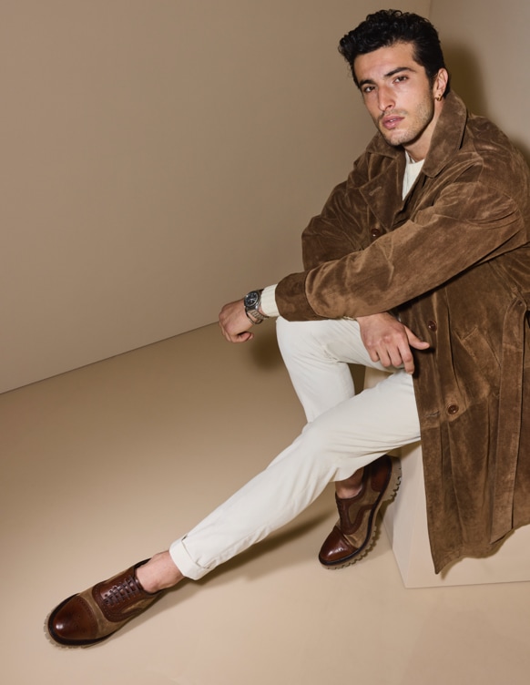 brown leather and tan suede wingtip with lug sole