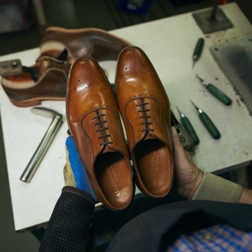 Allen Edmonds craftsperson in the Port Washington Studio