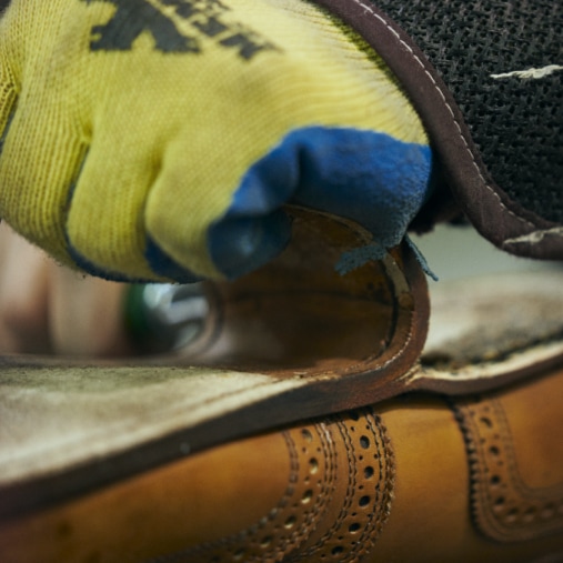 Allen Edmonds craftsperson in the Port Washington Studio