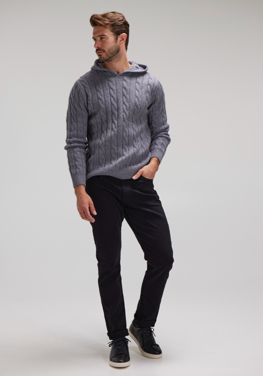 man wearing hooded sweater