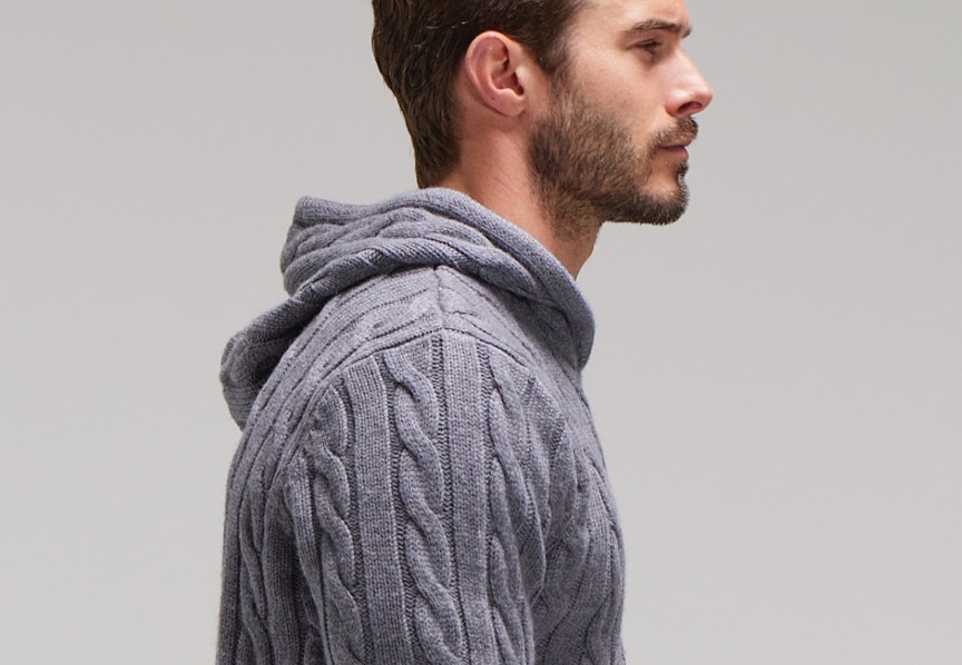 man wearing hooded sweater