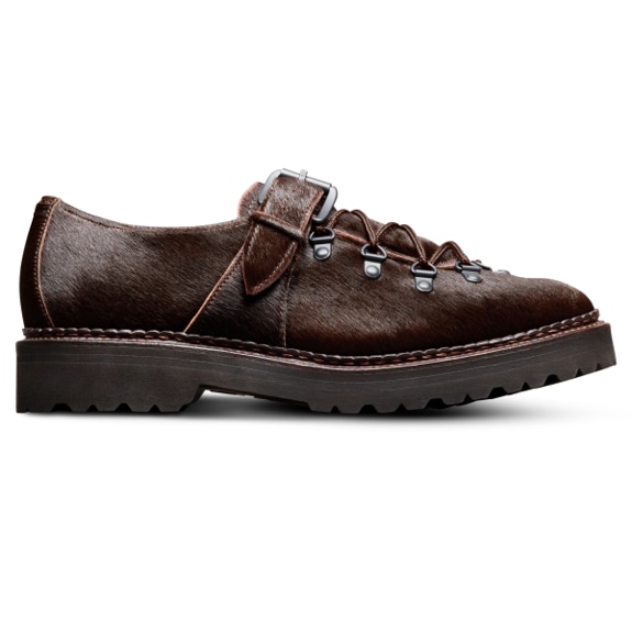 A side view of the Allen Edmonds Adirondack Low Hiking shoe in brown calf hair, with the toe facing right.