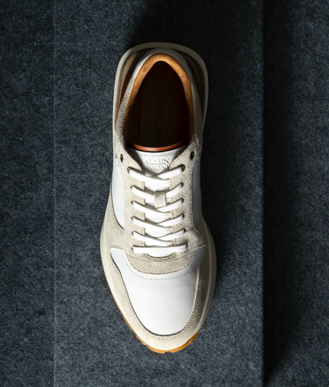A top view of the Allen Edmonds Lionel Lace Up Sneaker in white suede.