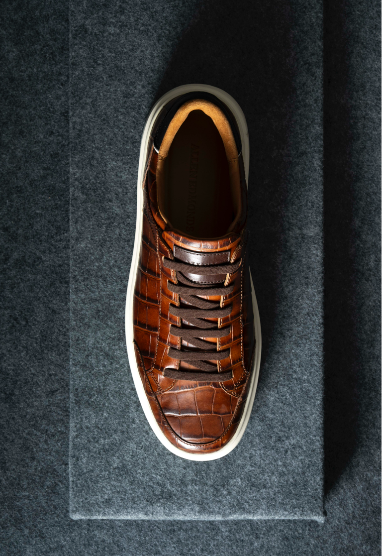 Top view of the Allen Edmonds Oliver Slip On sneaker in brown croco leather. 