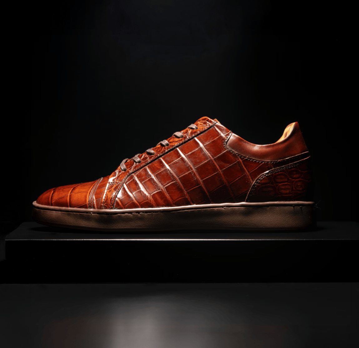 Chili brown crocodile leather Allen Edmonds Chambers sneaker with a low-profile sole.