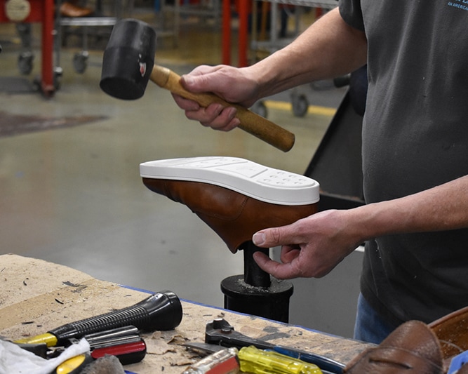 Outsoles hammered into place