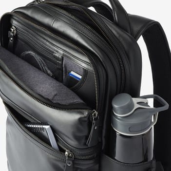 allen edmonds canvas and leather backpack Mens Black STYLE Sleek leather backpack Perfect for daily and travel use 16.8 inch H x 11 inch W x 5.4 inch D FUNCTION One large top zippered compartment one small top zippered compartment and one small zippered front poacket Top handle for easy carry when not worn on your back Built Leather Backpack | Men's Bags